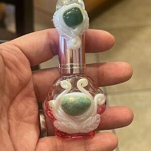 Unique Pink and Green Perfume Bottle
